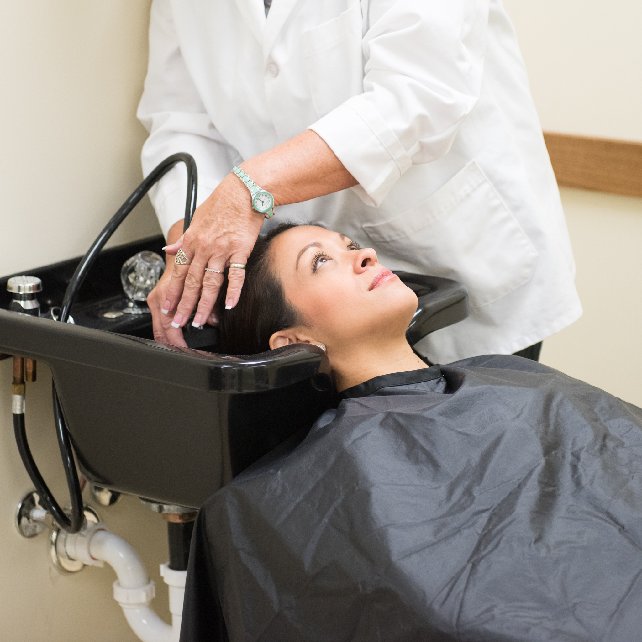 Woman getting hair washed